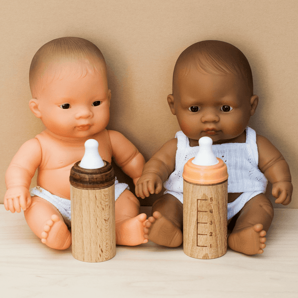 Baby boy doll with top bottle